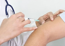 An adult receiving injection