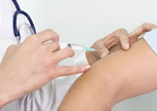 An adult receiving injection An adult receiving injection