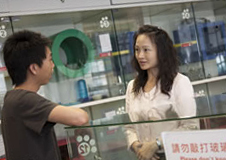 A man and lady in a pet shop