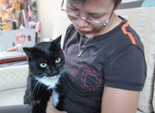 A lady with a cats A lady with a cat